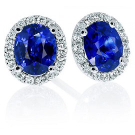 Glamorous oval royal blue sapphire and diamond hal..